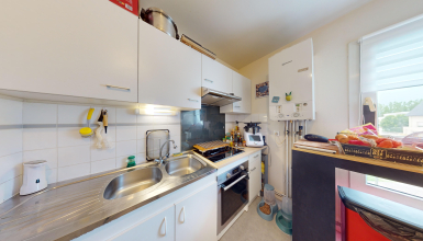 Appartement lumineux avec 4 chambres et garage en sous-sol